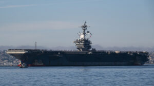 USS Abraham Lincoln aircraft carrier arrives in the Middle- East and is near Iran!